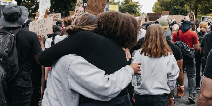 Embracing In A Crowd